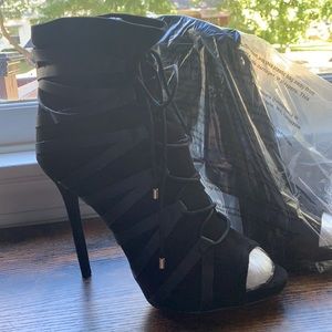 Black strappy peep toe bootie